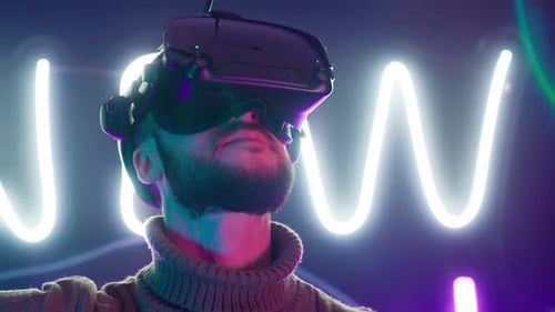 Man Immersed in Virtual Reality with VR Headset