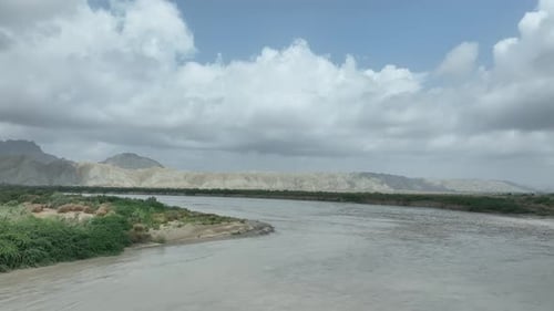 Serene Hingol River against Balochistan hills - aerial