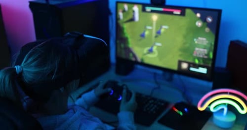 Child Wearing VR Headset Playing a Video Game
