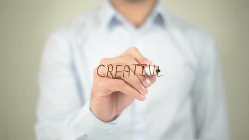 Creative Man Writing on Transparent Screen