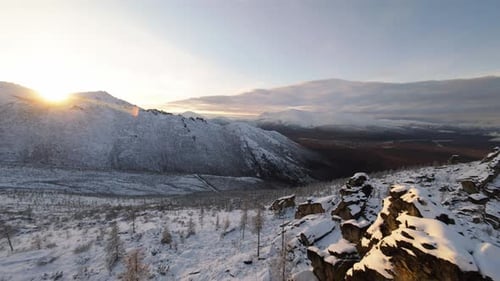 Stunning Aerial View of Snowy Yakutia Mountains at Sunrise Captures Nature's Beauty