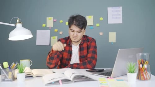 Depressed male student.