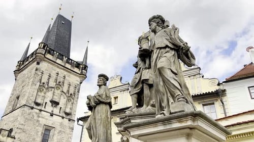 Sculptures Adorn City Building's Facade Against the Sky