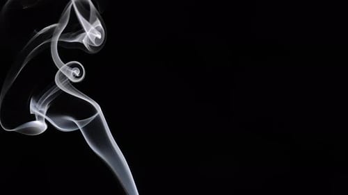 Elegant wispy smoke on a black background
