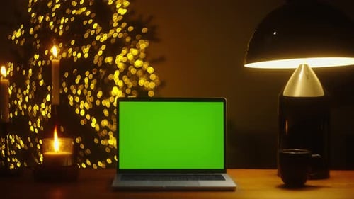 Experience the Magical Christmas Spirit with a Festive Desk Setup Mockup Chroma Key Green Screen and