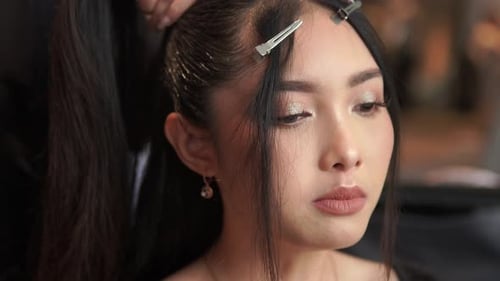 Woman Having Hairstyle Created by Hair Stylist