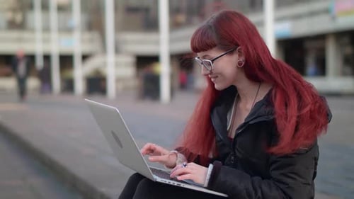 Close up portrait of hipster student completing a project
