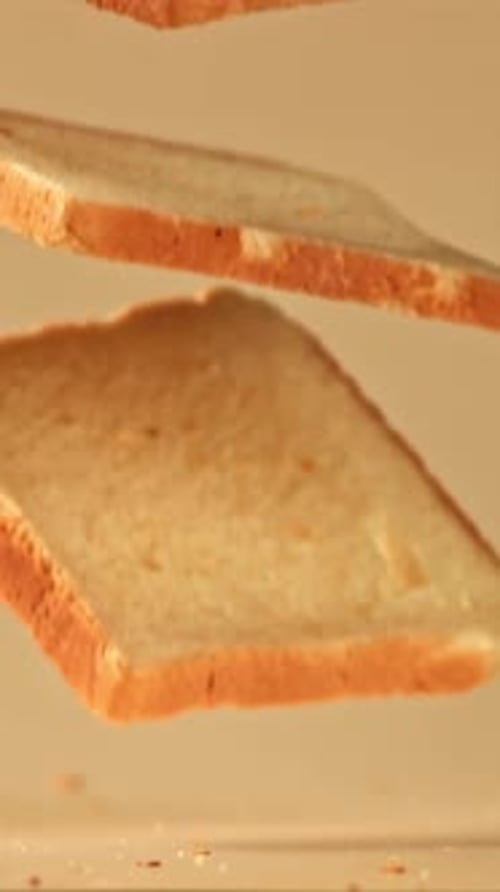 Pieces of Bread Fall on the Table Filmed on a Highspeed Camera at 1000 Fps