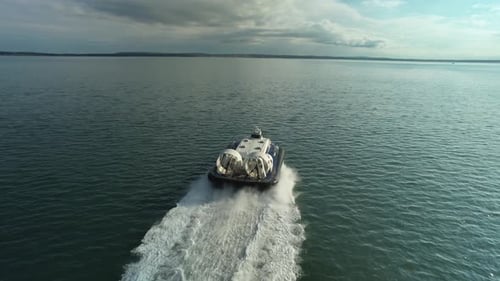 Hovercraft From Portsmouth Speeding On Water With Backwash In The Solent Strait To Isle of Wight In
