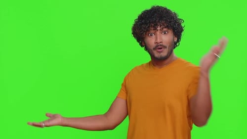 Indian Man Showing Thumbs Up Pointing Empty Place Advertising Area for Commercial Text Copy Space