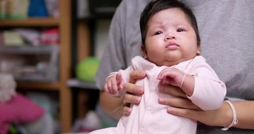 Close Up of Infant Yawning and Crying