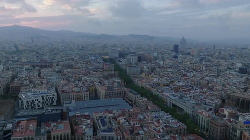 Aerial Panoramic Footage of Metropolis After Sunset Streets and Buildings in Urban Borough Barcelona