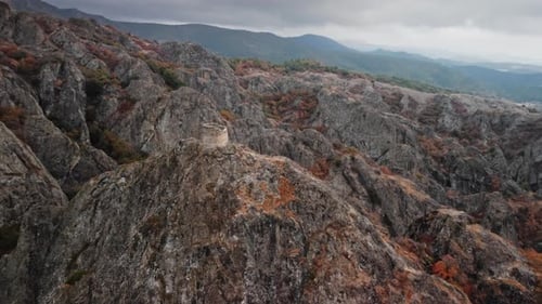 Drone Shot of Ancient Tower on Rocky Mountain