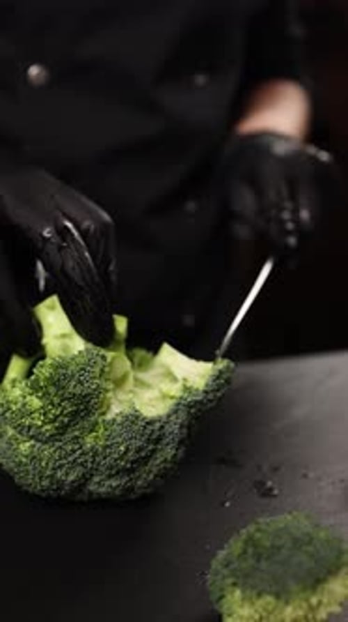 The chef prepares a vegetable dish. Cooking broccoli