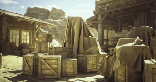 Old Western Town with Wooden Crates Covered By Tarps Under Bright Sunlight