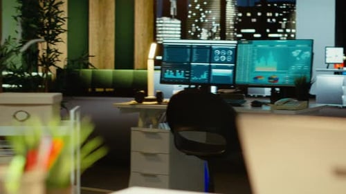 Modern Business Workspace Glows with Forecasting Metrics and Graphs