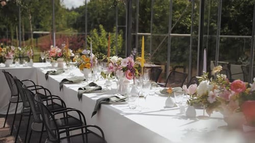 Elegant Wedding Table Setting with Floral Decorations