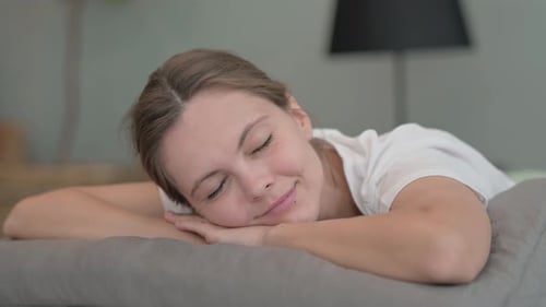 Relaxed Woman Resting Peacefully Indoors
