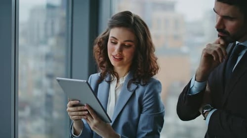 Smiling Woman Manager Presenting Work Plan to Boss Standing Window Close Up