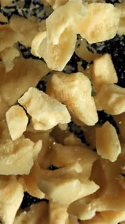 Parmesan Cheese Flies Up and Falls Down Filmed on a Highspeed Camera at 1000 Fps