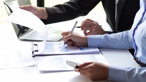 Teamwork Collaboration in Modern Office with Data Analysis