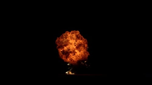 Collection Detonate : Explosion suivie d'étincelles tourbillonnantes au centre sur fond noir filmée
