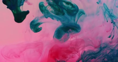 Swirling Blue and Red Ink Creates Abstract Designs