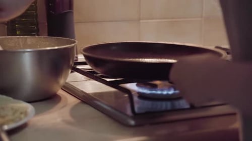 Cooking Pancakes in Kitchen