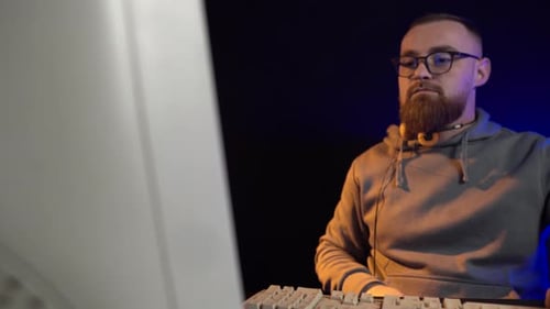 Computer Man Behind CRT Monitor and Desktop PC From 1990's, Close Up