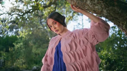 Model Posing Fairytale Forest Leaning at Tree Trunk Close Up Mesmerizing Woman