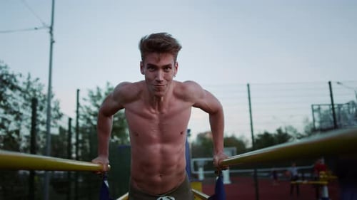 Portrait of Focused Muscular Sportsman Training Street Workout Outdoor. Closeup Sporty Man