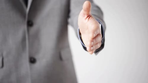 Business, People, Gesture, Partnership and Office Concept - Close Up of Businessman