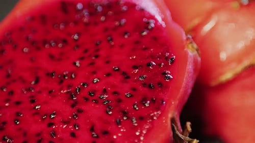 Ripe Red Dragon Pitahaya Fruit with Half Isolated on White Kitchen Background