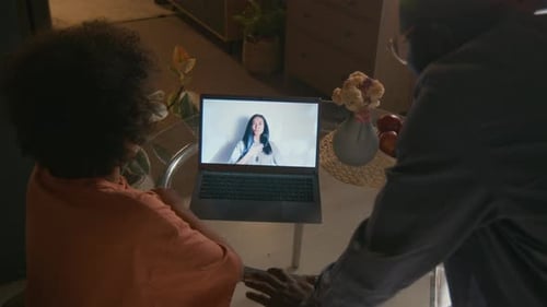 Family Video Call on a Laptop