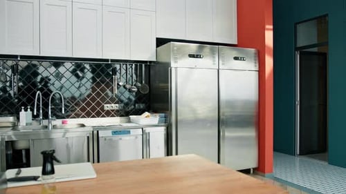Professional commercial empty clean modern kitchen in restaurant or cafe Metal kitchen equipment