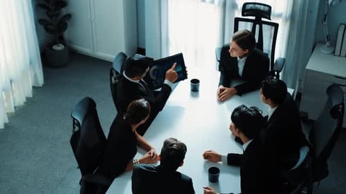 Top view of project manager present financial graph on tablet. Directorate.