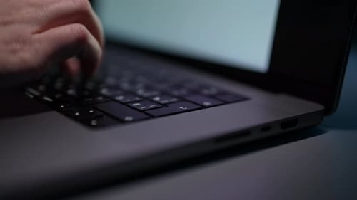 Closeup Finger of Unrecognizable Businesswoman Pressing Enter Key on Modern Laptop Keyboard Busy