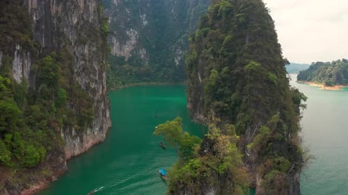 Three limestone rocks Three Brothers at Cheow Lan Lake, Khao Sok National Park, Surat Thani Province