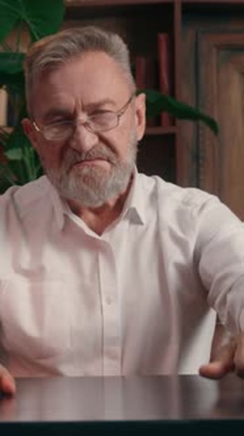 Negative Dissatisfied Caucasian Old Aged Senior Business Man Showing Thumb Down Dislike Gesture