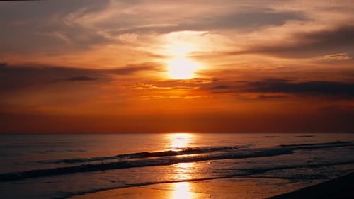 Sunset Reflections Over the Ocean Waves