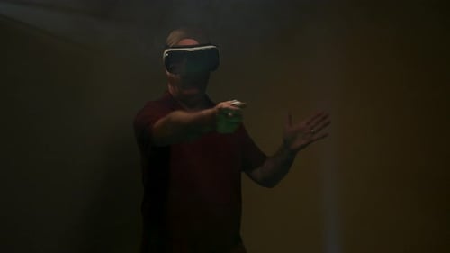 Man Immersed in Virtual Reality with VR Headset