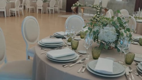 Elegant Wedding Table Setting with Floral Centerpiece