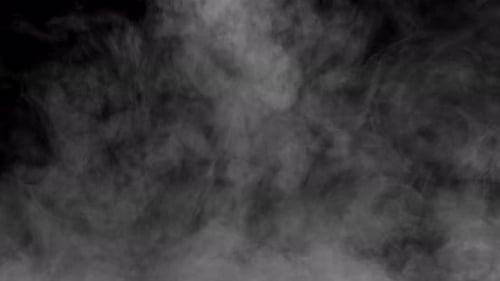 Wispy White Smoke on Black Background