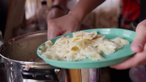 Mixing Various Fresh Ingredients Together in a Pot for a Delicious and Enjoyable Meal