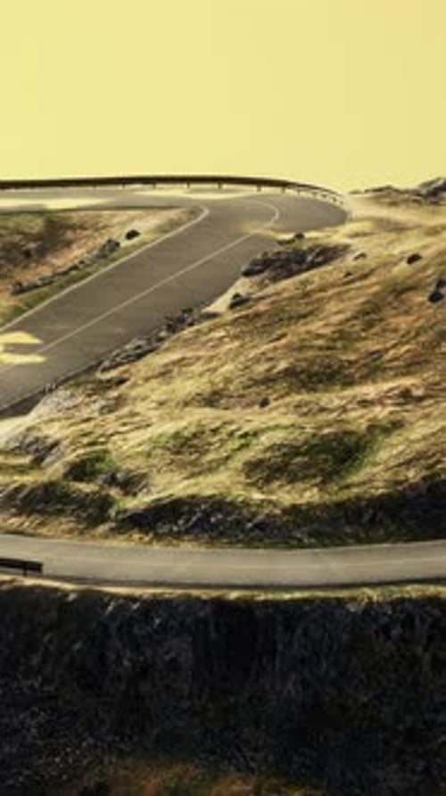 Empty Winding Road Towards the White Sands