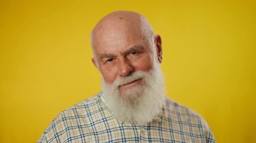 Senior Man with White Beard Smiling in Close Up