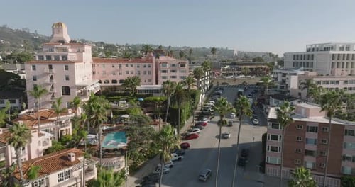 a city street with cars and buildings
