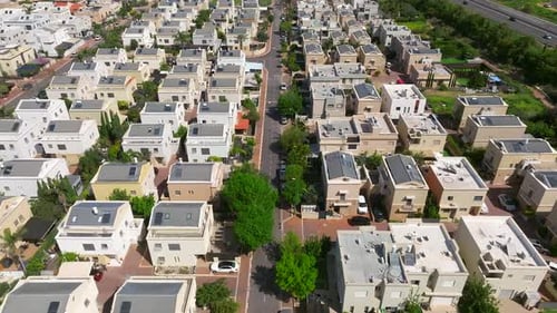 Suburban neighborhood homes with small private yards, typical middle class housing, Aerial view