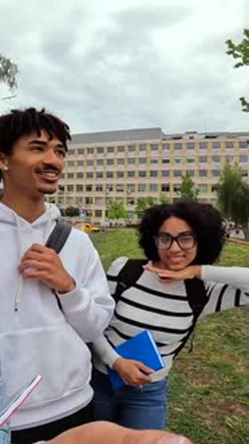 Happy Students Film Themselves on College Campus