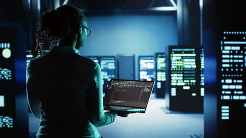 Engineer Coding in Data Center